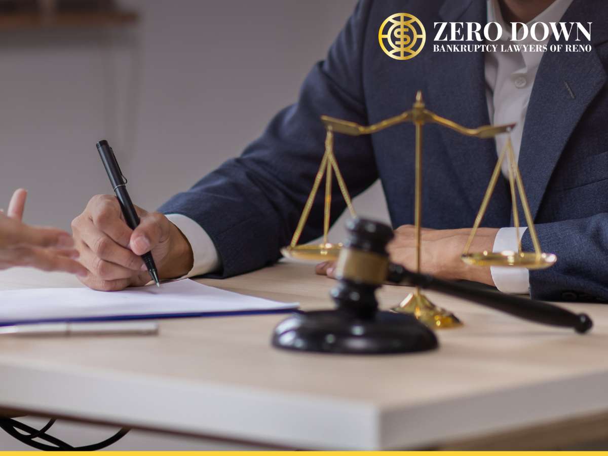 A client and attorney discussing legal options for foreclosures in Nevada with documents on the table