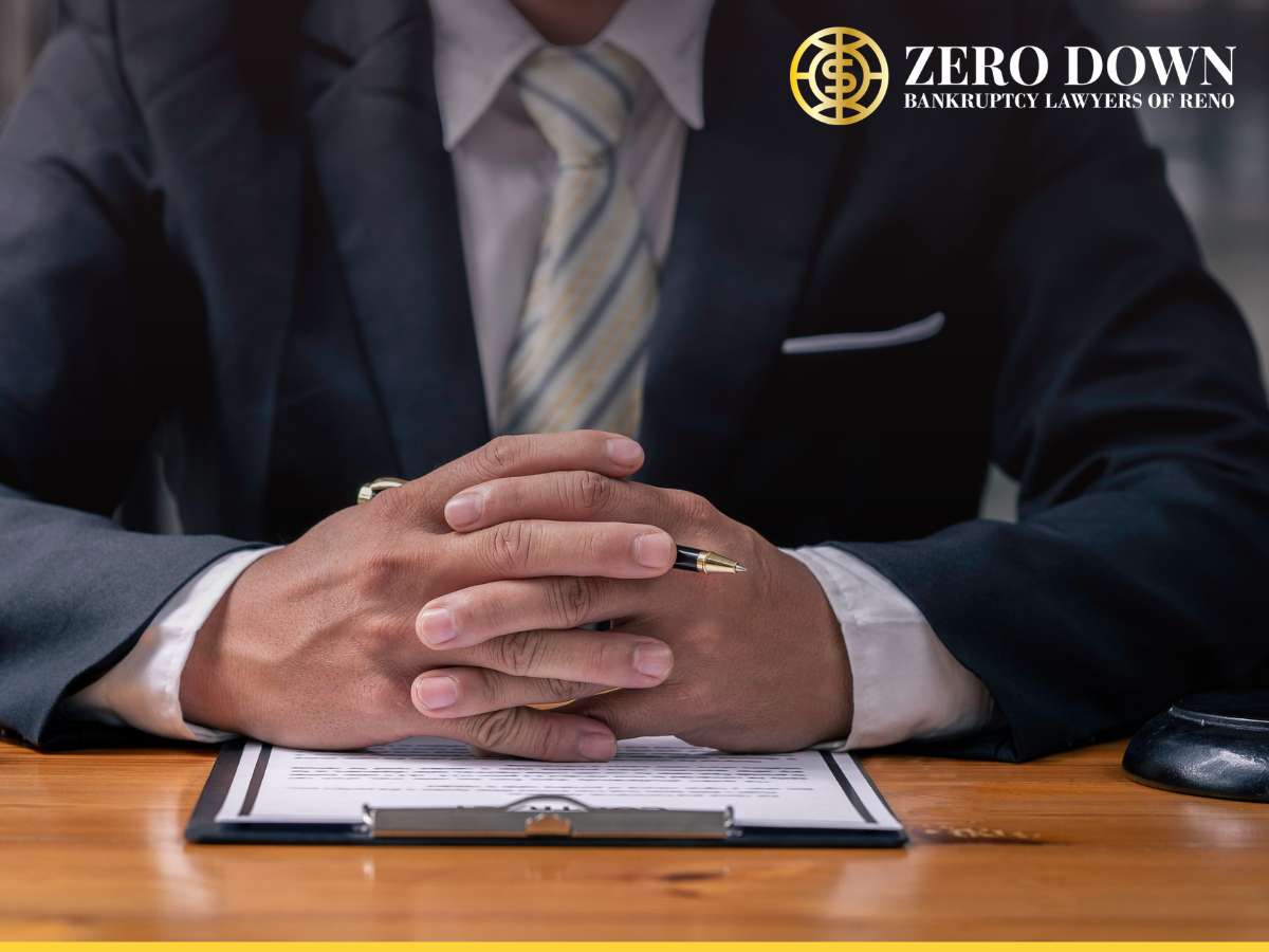 Las Vegas Bankruptcy Filing attorney reviewing paperwork at desk